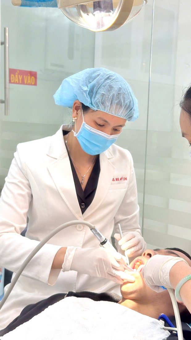 Dr. My Chi treating a patient